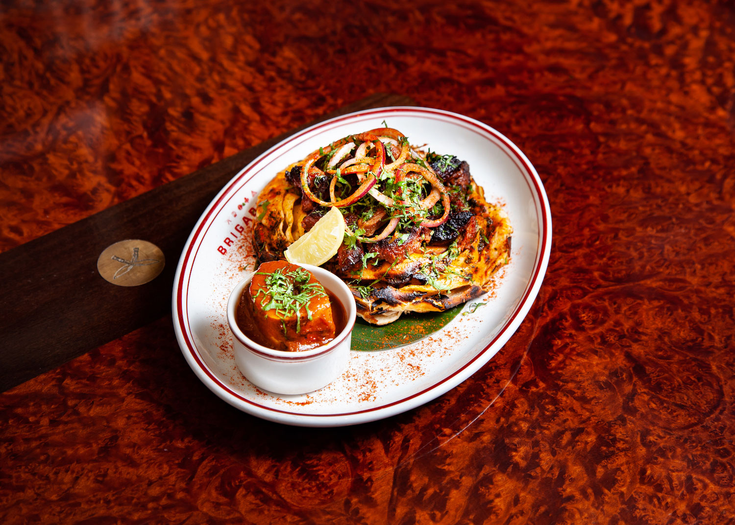 kid goat shoulder with lacha paratha